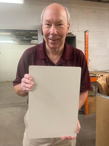 Hal Speath holding DryErase board